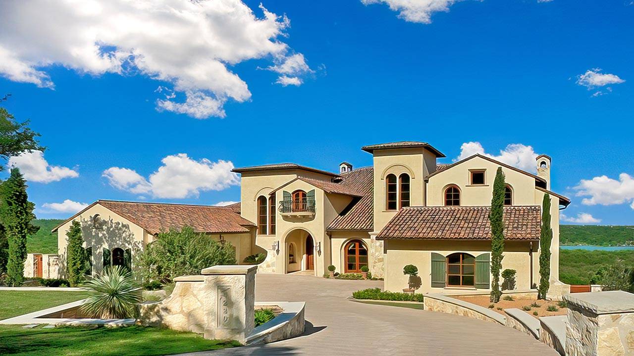 Projects Custom Tuscan design home with stucco and tile roof.